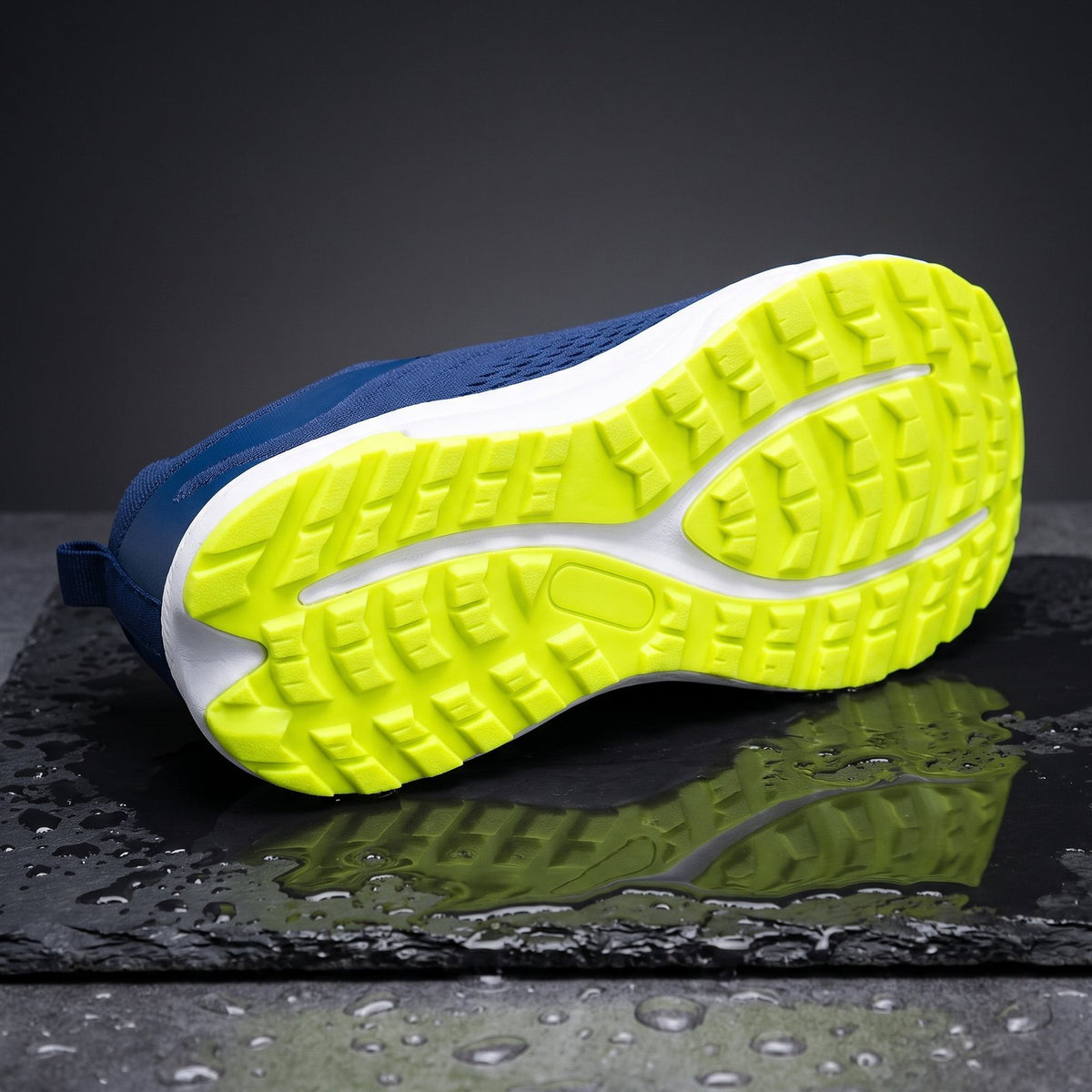 Bolster's volt lugged outsole on wet slate