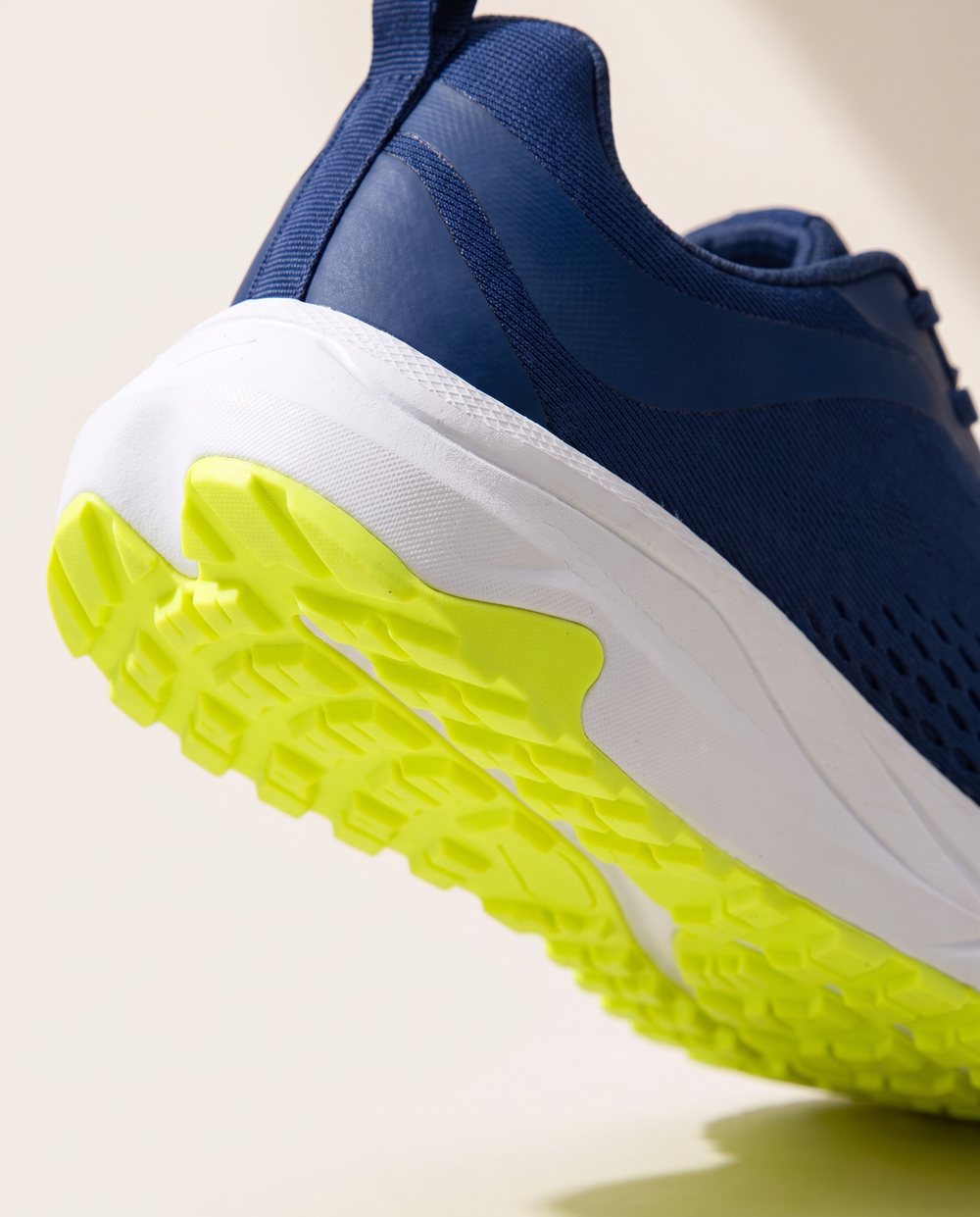 Close-up of Bolster's tall foam heel and volt outsole