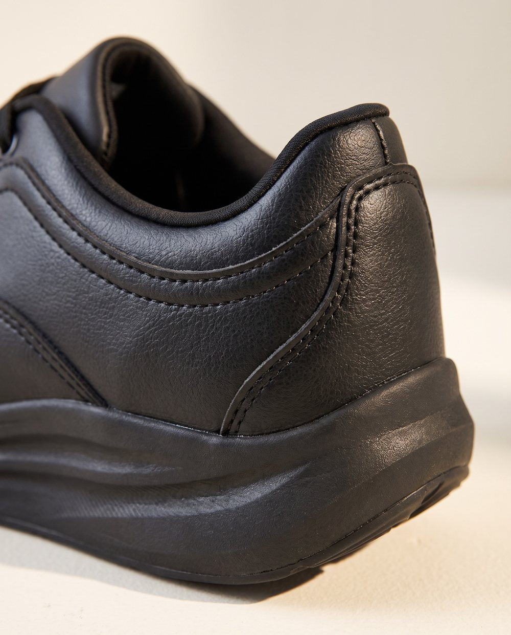 Close-up of Ledger's padded heel and rocker sole